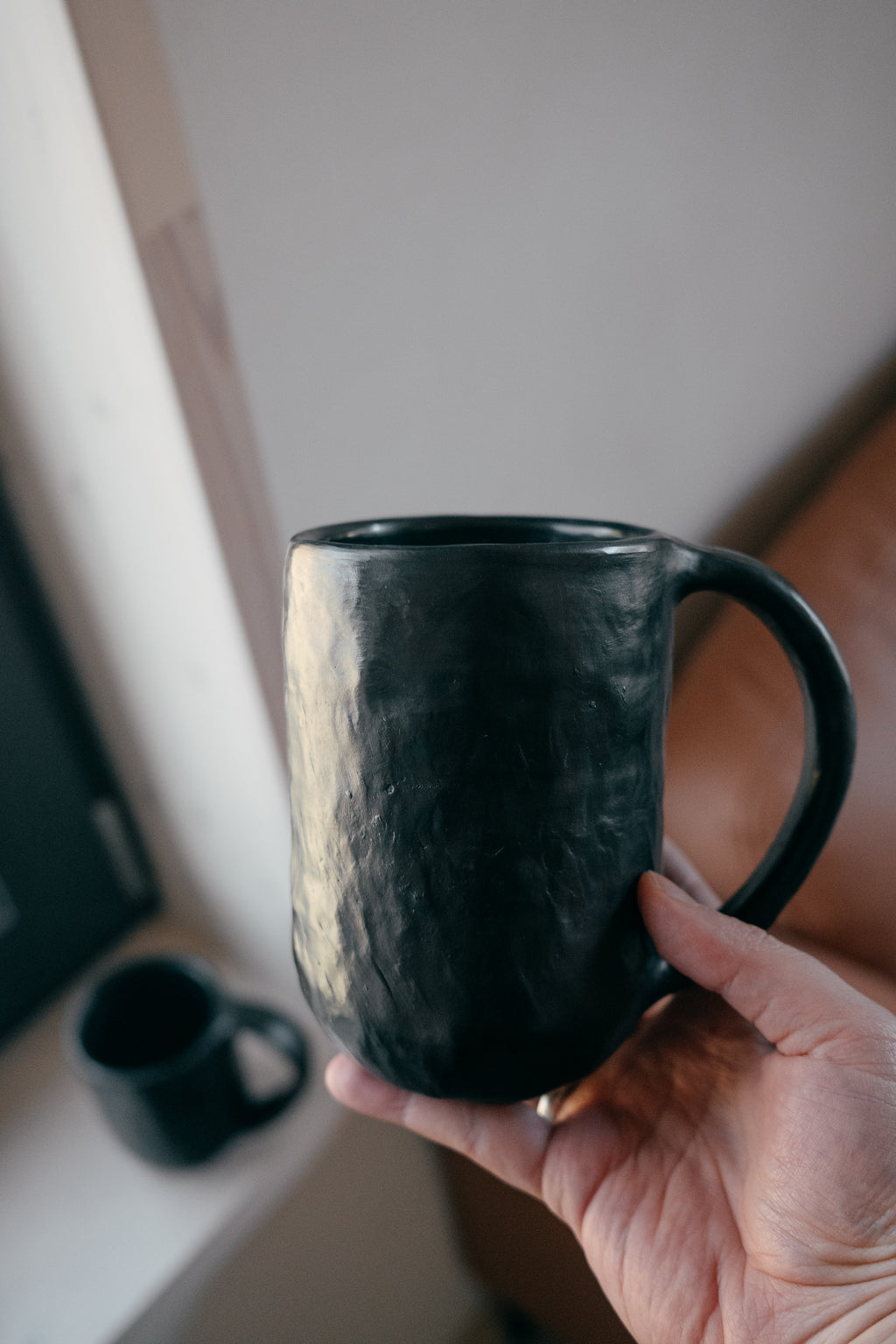 Black mug | Reduced Clay Ceramics